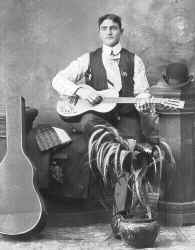 Man-Guitar.jpg (7061 bytes)